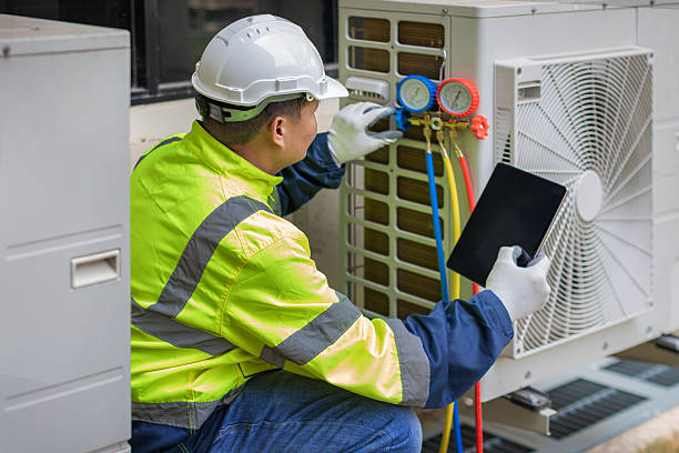 Professional Hvac technician working in Tad, WV